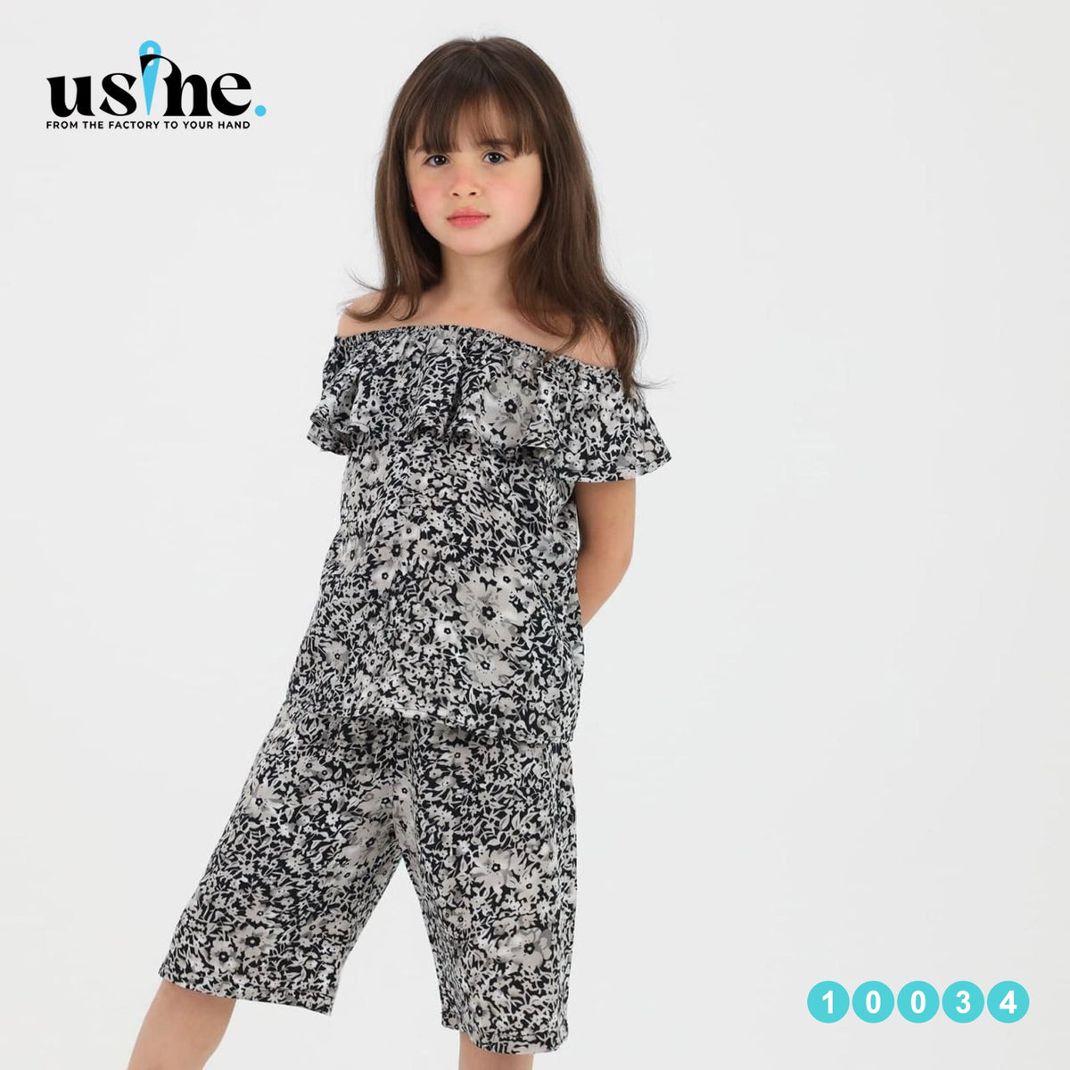 10034 Girls' off-shoulder top and floral shorts set