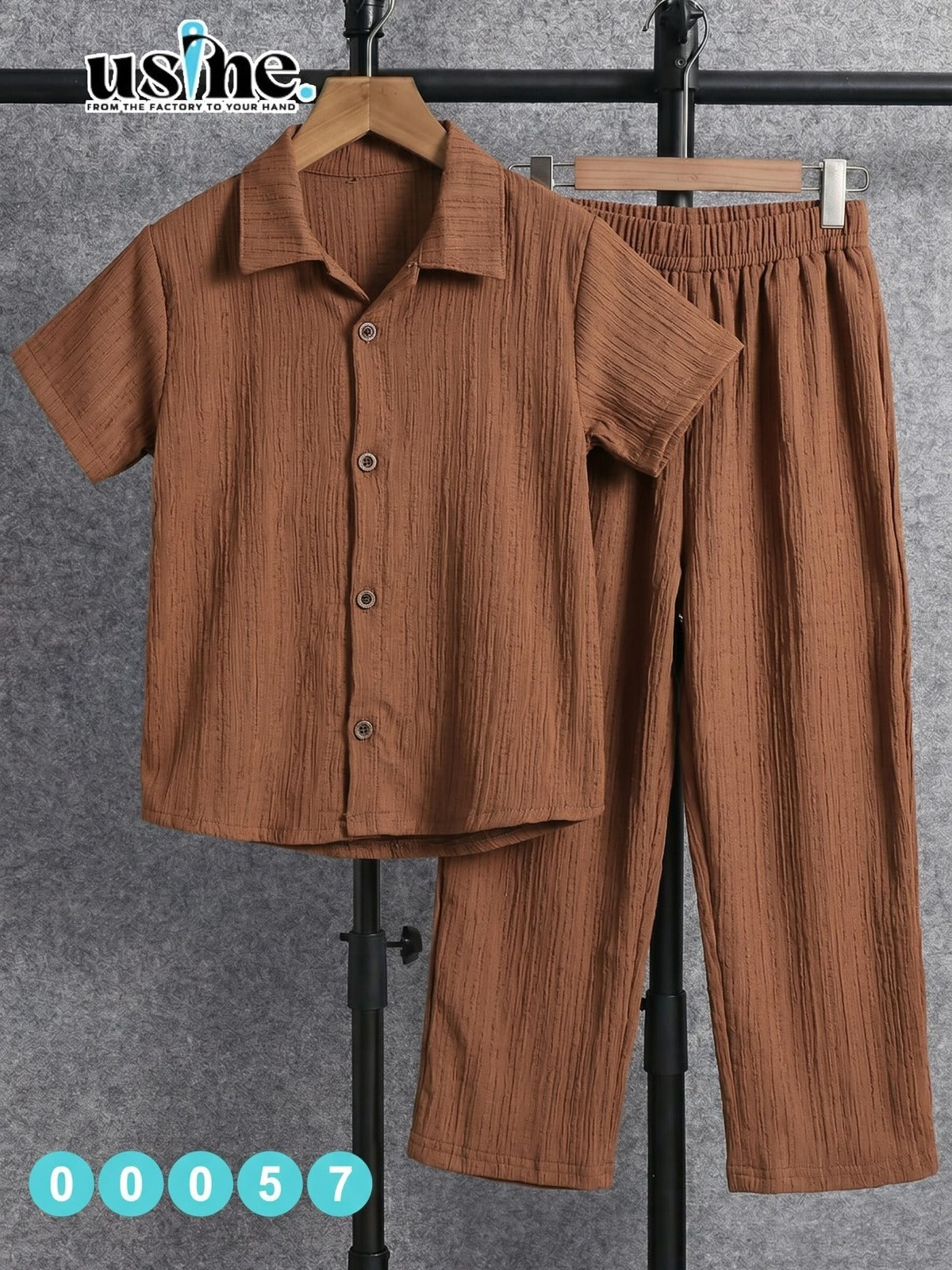 00057 She sewed a two-piece outfit for my children: a button-down shirt and trousers.