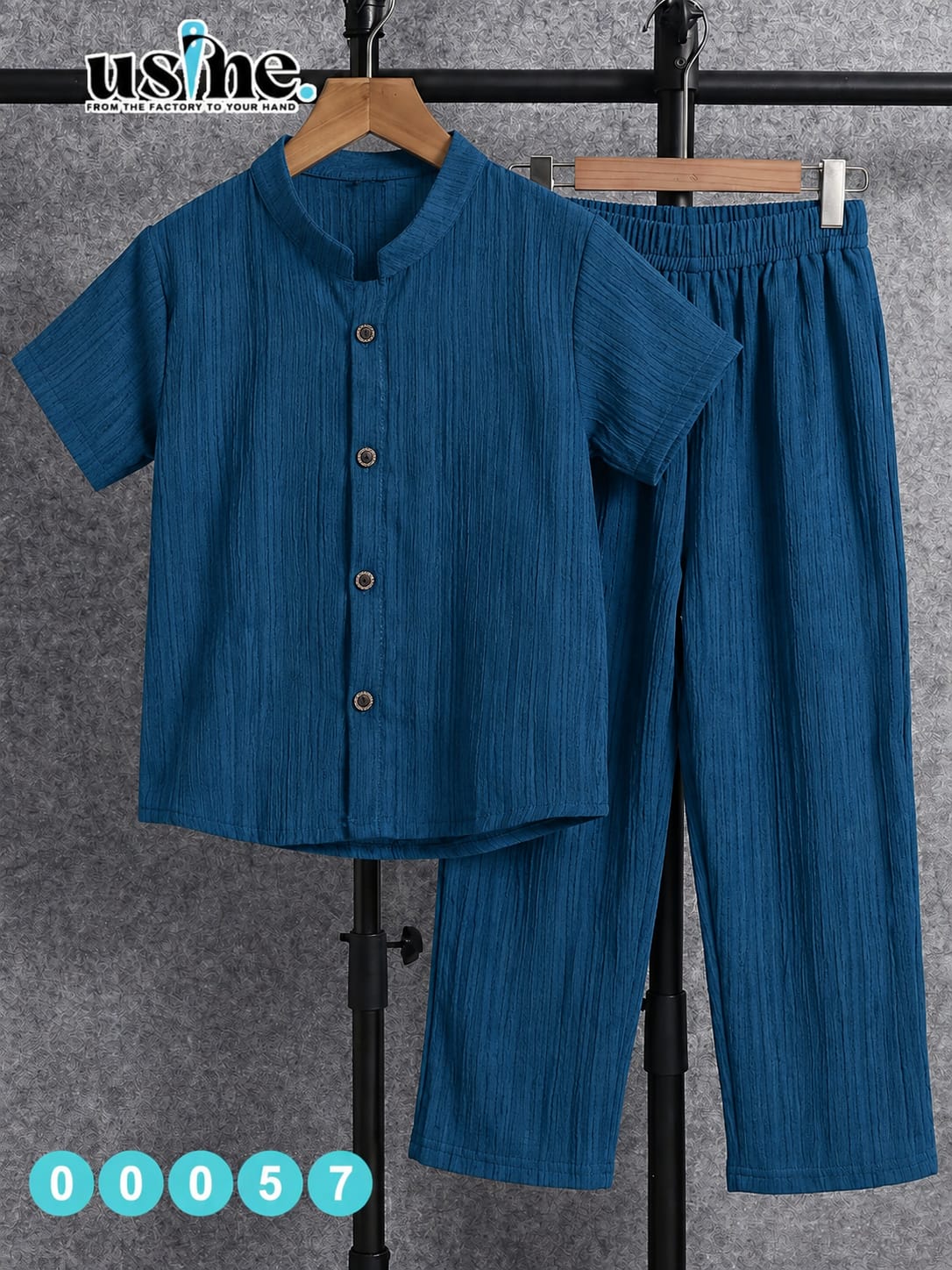 00057 She sewed a two-piece outfit for my children: a button-down shirt and trousers.