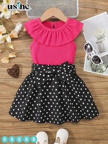 00068 Girls' outfit, polka dot blouse and skirt