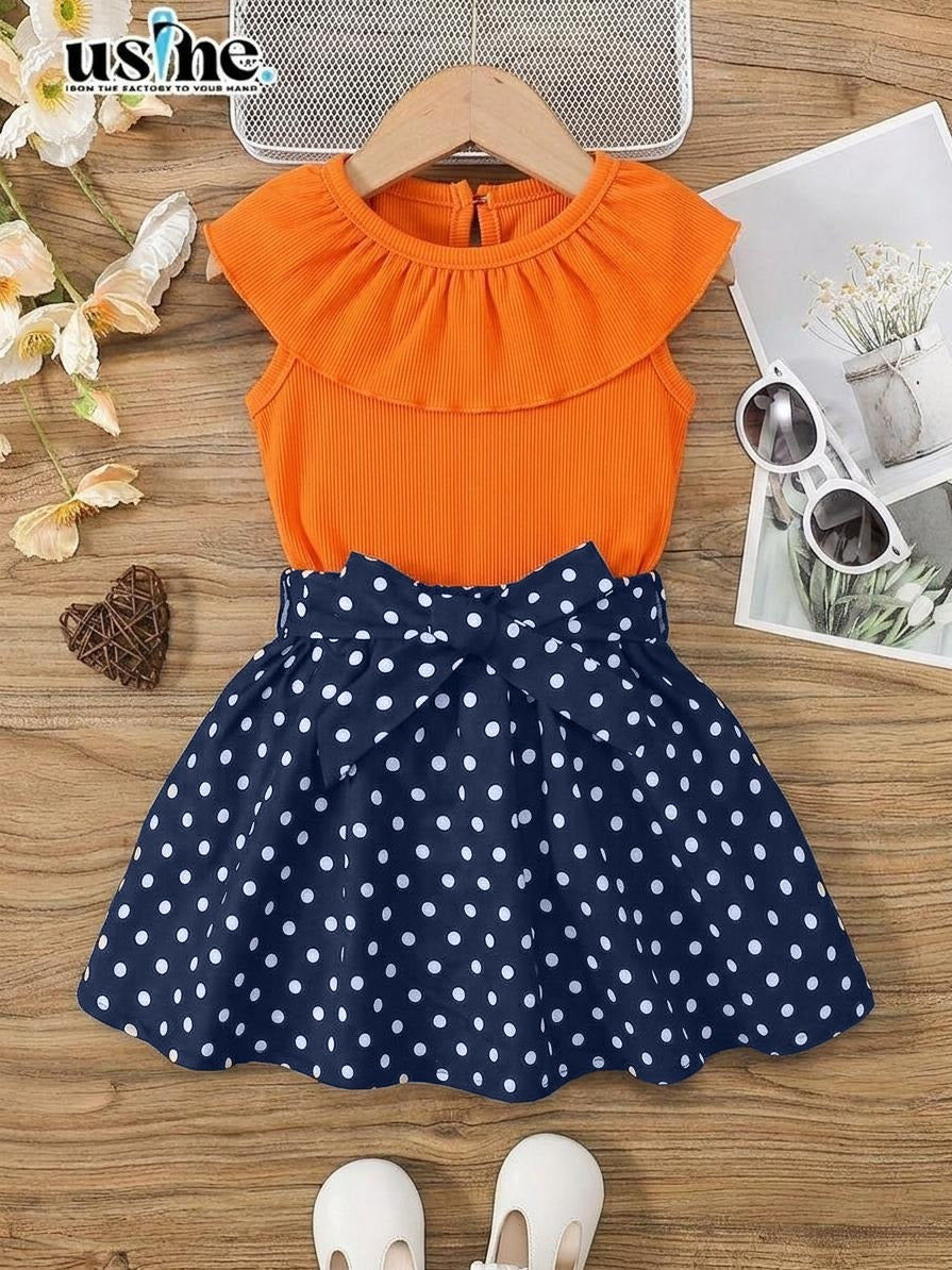 00068 Girls' outfit, polka dot blouse and skirt