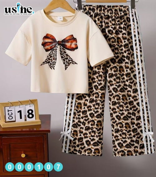 000107 Girls' set: bow t-shirt and tiger print trousers with white stripe