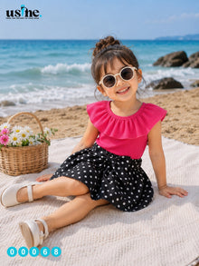 00068 Girls' outfit, polka dot blouse and skirt
