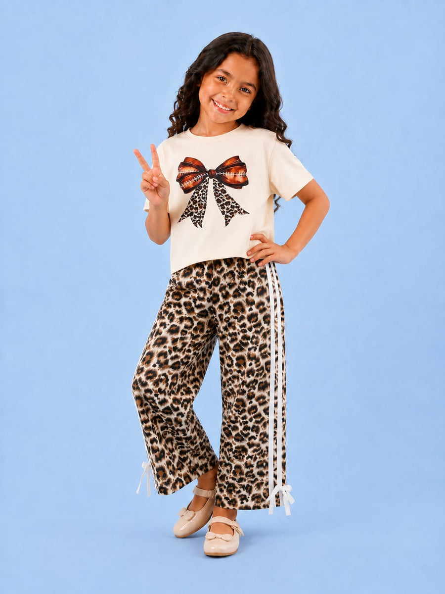 000107 Girls' set: bow t-shirt and tiger print trousers with white stripe